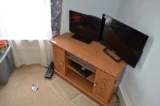 (2) Smaller flat screen TV's, entertainment center, VCR/DVD player