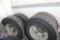 (4) 315/80R22.5 Tires on Steel Hub Pilot Rims