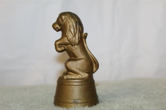 Cast Iron Lion on a Tub Bank