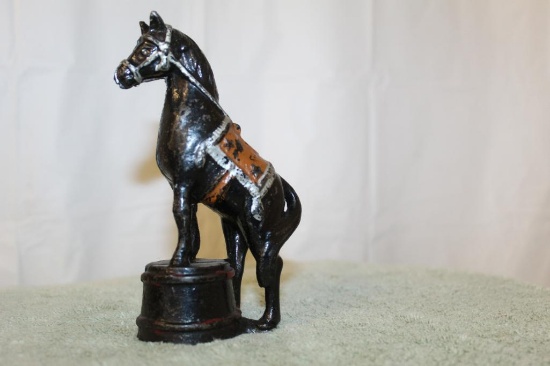 Cast Iron Horse on a Tub Bank