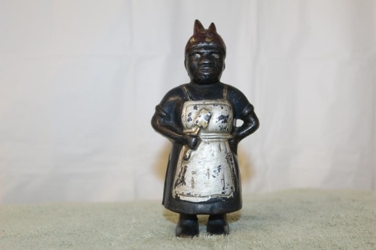 Cast Iron Lady With Spoon Bank