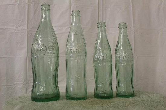 (4) Coca-Cola Bottles