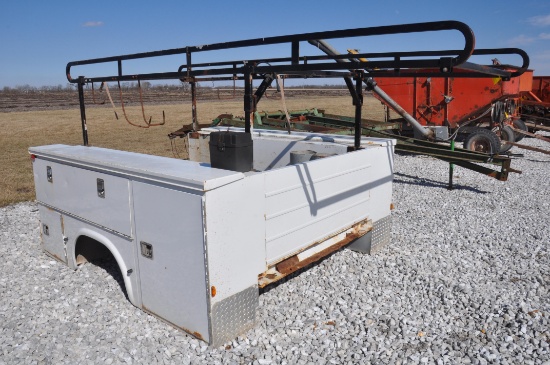 Utility bed w/ ladder rack off Ford F-350 pickup