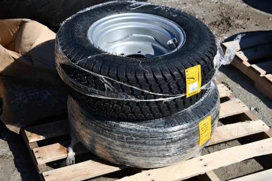 (2) 25x8.5x14 tires on Case-IH wheels