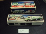 2 OLD HESS TRUCKS STILL IN BOX, NO SKU #S