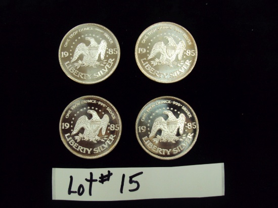 LOT OF 4 - 1985 SILVER COINS - ONE TROY OUNCE SILVER EACH - MULTIPLY YOUR BID BY 4