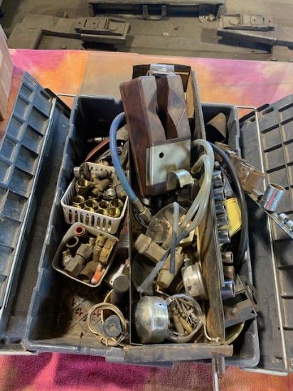 tool box loaded with shop supplies