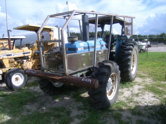 10-01134 (Equip.-Tractor)  Seller:Florida State FWC FORD 6610 4X4 OROPS DIESEL TRACTOR