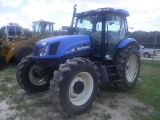 9-01172 (Equip.-Tractor)  Seller: Florida State F.W.C. NEW HOLLAND TS125A ENCLOSED CAB 4X4