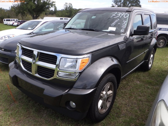 10-11134 (Cars-SUV 4D)  Seller: Gov-Orange County Sheriffs Office 2011 DODG NITR