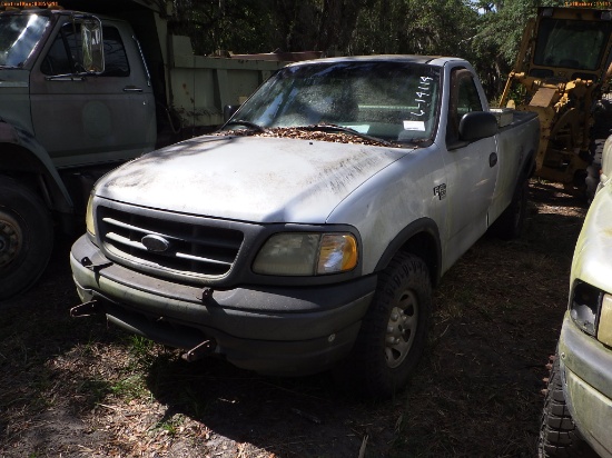 7-14114 (Trucks-Pickup 2D)  Seller: Florida State F.W.C. 2002 FORD F150