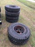 6 Unused Goodyear G165 RTD 10.00R20 Tires and 4 with Wheels