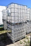 2 Caged Poly Tanks on Skid