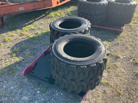 4 - 10-16.5 Skid Steer Wheels and Tires Unused