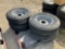 Four Unused ST235/80R16 Tires and Wheels