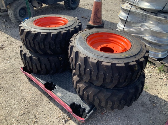 4 Unused 12-16.5 Skid Steer Tires w/ wheels