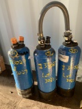 Three deionized water tanks with hose