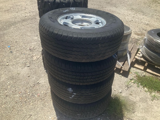 Four Michelin 275/70 R16 Tires