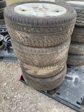 4 tires w/ wheels - used