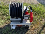 Fuel hose reel dispenser unit