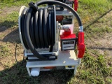 Fuel hose reel dispenser unit