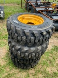 4 Loadmax unused skid steer tires w/ rims