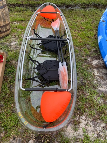 Two person, see through canoe w/ paddles