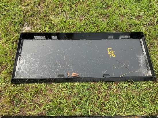 Unused skid steer quick attach plate