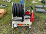 Fuel hose reel dispenser unit