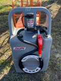 Portable fuel tank on cart with wheels, pump, hose and nozzle