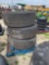 3 used commercial tires, two with wheels