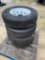 Four ST225/75R15 Unused Trailer Tires and Wheels