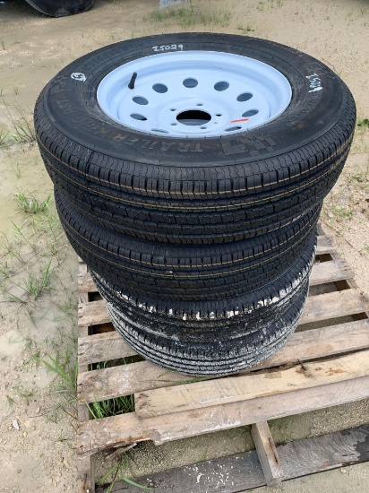 Four 205/75R15 Unused Trailer Tires and Wheels