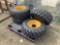 Four Unused 12-16.5 Skidsteer Tires with Rims