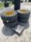 Four Unused Camso 12-16.5 Skid Steer Tires and Wheels