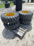 Four Unused Camso 12-16.5 Skid Steer Tires and Wheels