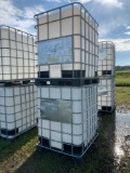 Set of Two Skid Mounted Caged Poly Tanks