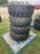 Four Unused Loadmaxx 12-16.5 Skid Steer Tires and Wheels