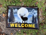 Welcome sign with Moose backdrop