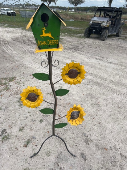 John Deere birdhouse on sunflower stand