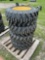 Four Unused Camso 12-16.5 Skid Steer Wheels and Tires