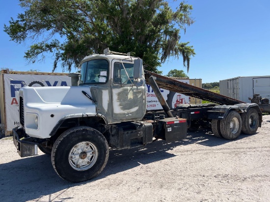 1994 Mack DM690S T/A Rolloff Truck