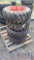 (4) Unused Skid Steer Tires with Wheels