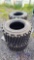 (4) Unused Skid Steer Tires with Wheels