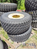 Four used tractor tires with wheels