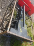 Unused Wolverine skid steer trencher attachment