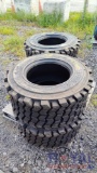 (4) Unused Skid Steer Tires with Wheels