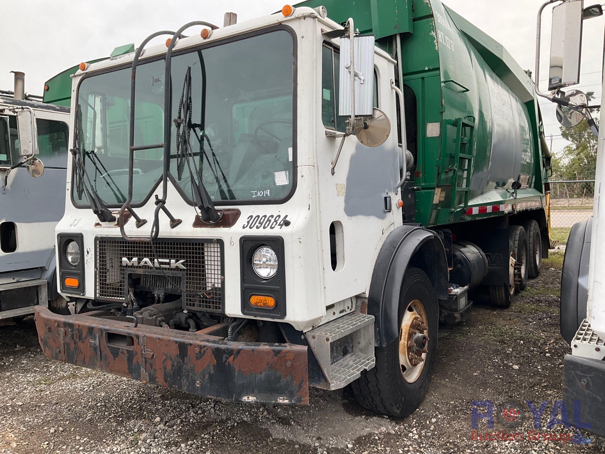 2005 Mack MR688S Tri Axle McNeilus 3213 32 yd | Proxibid