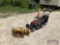 1 Trimer Rack and 1 Troy Bilt Lawn Mower