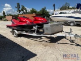 Two Kawasaki JetSkis ultra 250x w/ trailer